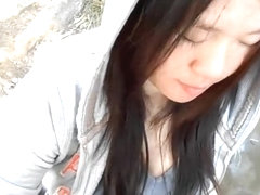 Petite Asian Blows Cock in a Park
