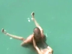 Couple fucking in sea