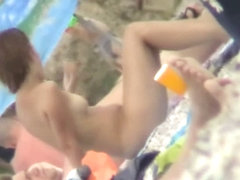 Hidden cam on a nudist beach shows men and women
