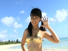 Asian hottie Misuzu posing on a beach