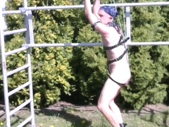 naked slave BDSM CBT outdoor in slaveharness