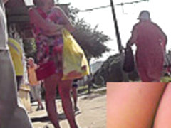 Outdoor upskirt scene filmed at the local bus stop