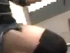 Japanese girl rides a bike with short skirt in streets