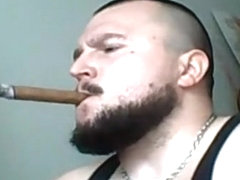 Big Man smoking big cigar