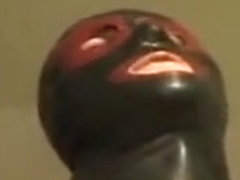Masturbating with a mask on the face