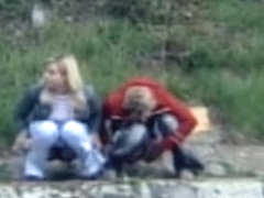 Two shameless girls hidden cam pissing outdoor