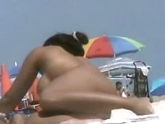 Sexy babes filmed playing on the beach