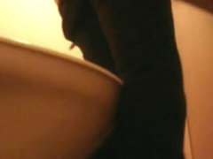 Fem sitting on toilet spied in voyeur cam from below