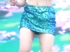 Girl in short skirt dancing