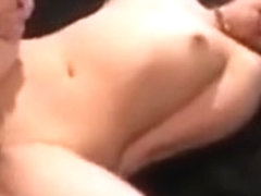 Japanese cutie takes a dick in her snatch and another down