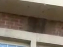 Shameless couple on balcony